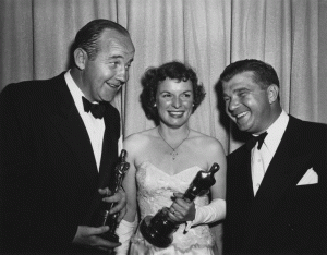 "All the King's Men," a political noir from 1949, garnered Best Picture, Best Actor for Broderick Crawford and Best Supporting Actress for Mercedes McCambridge. The gold winners savor the moment with director Robert Rossen.